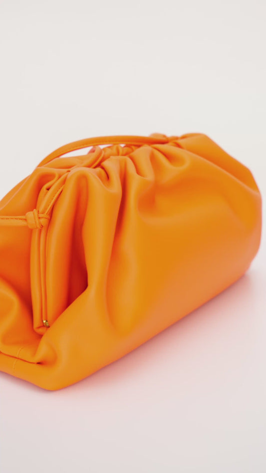 The Jeanie Leather Clutch in Orange