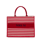Red canvas tote bag with stripes and personalized initials