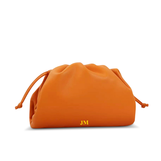 The Jeanie Leather Clutch in Orange