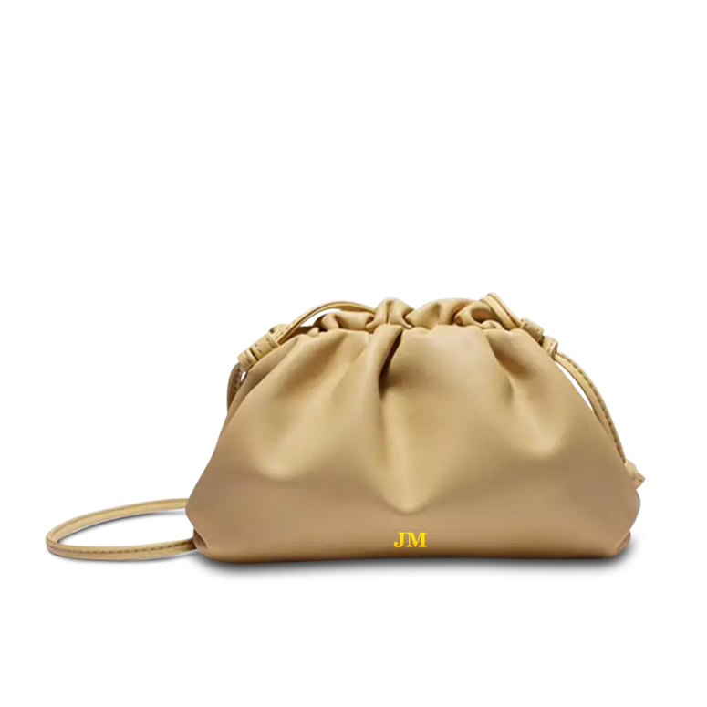 The Jeanie Leather Clutch in Pastel Yellow